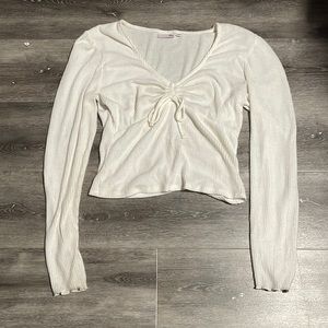 I am selling this white long sleeve shirt